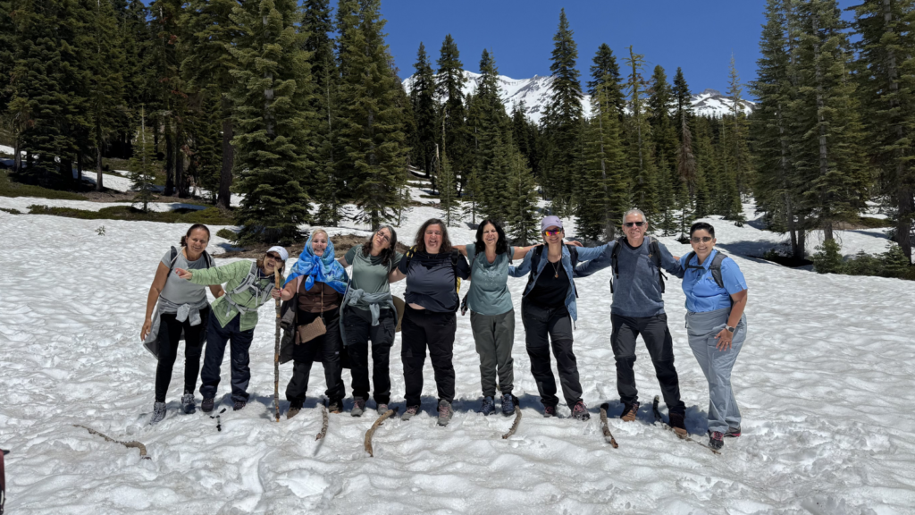 Group of participants at Olimpo spiritual retreats around the world