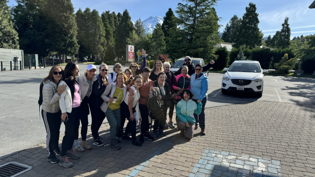 Retreat participants gathered outdoors together in nature